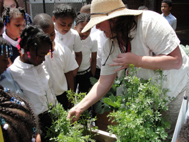 Detroit Merit Charter Academy learn in a Teaching Garden sponsored by Health Alliance Plan and the American Heart Association.