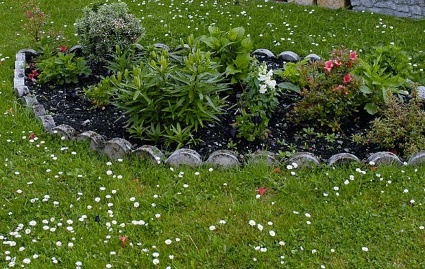 Enjoy the look but don't rely on small fence or edge sections to block weeds. Even if they are deep enough to thwart the adjacent lawn or groundcover, they'll need help at the seams.