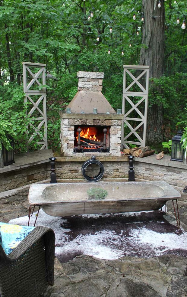 This outdoor fireplace is a cozy place to sit any time of the year.