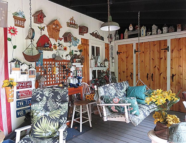 The “Cracker Barrel” porch is a perfect place to relax and enjoy the garden.